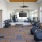 Gym with various equipment and natural lighting