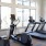 Gym with various equipment and natural lighting