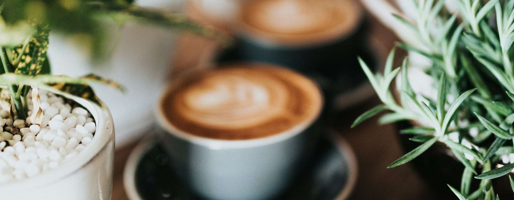 a couple of coffee cups on a table